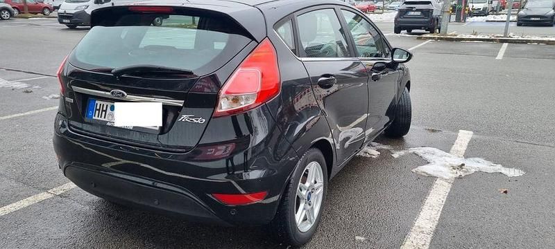 Gebraucht Ford Fiesta Titanium 101 PS (74 kW) 2013 Schwarz Kleinwagen