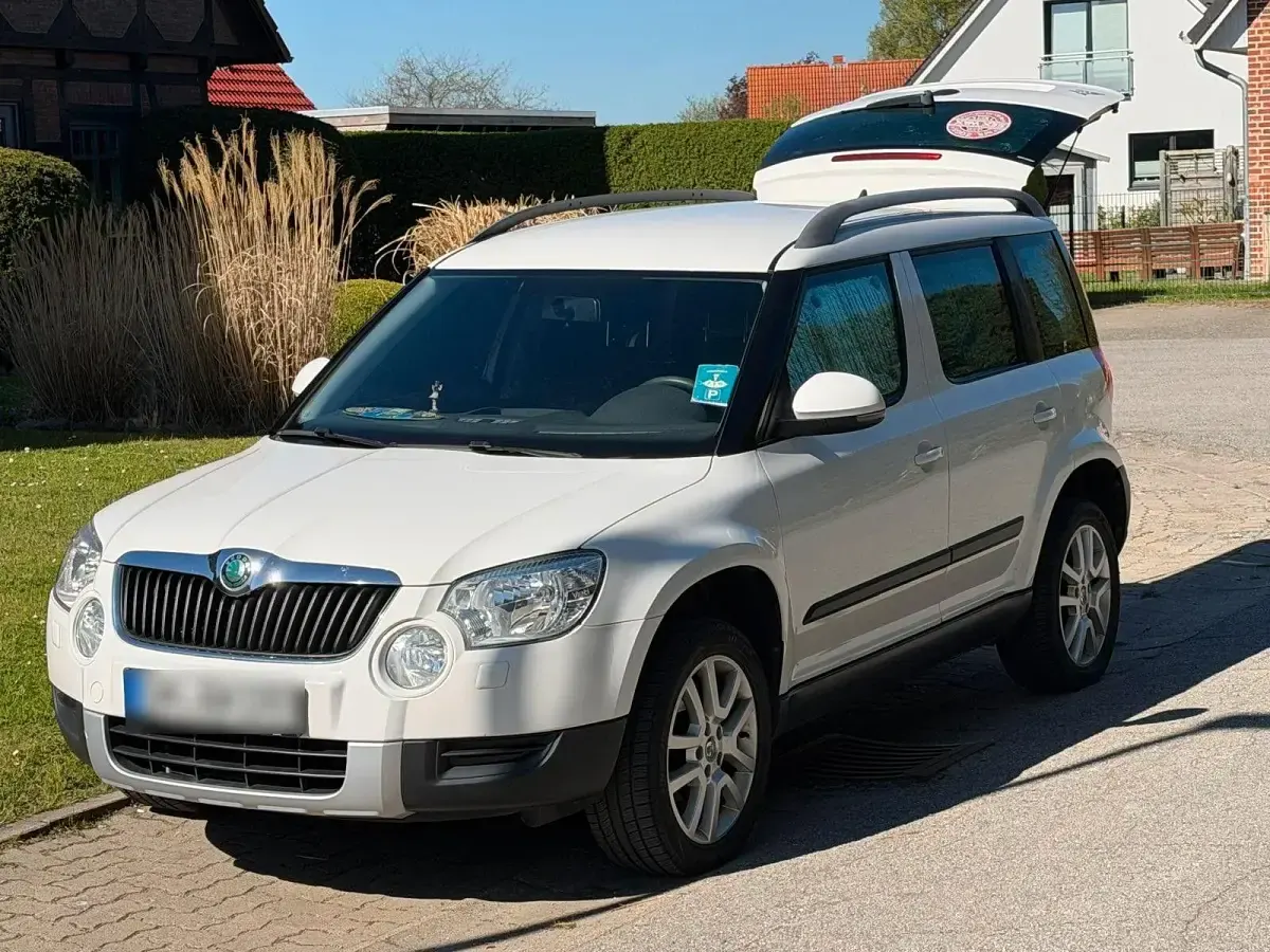 Gebraucht Skoda Yeti Active 105 PS (77 kW) 2013 Weiß SUV