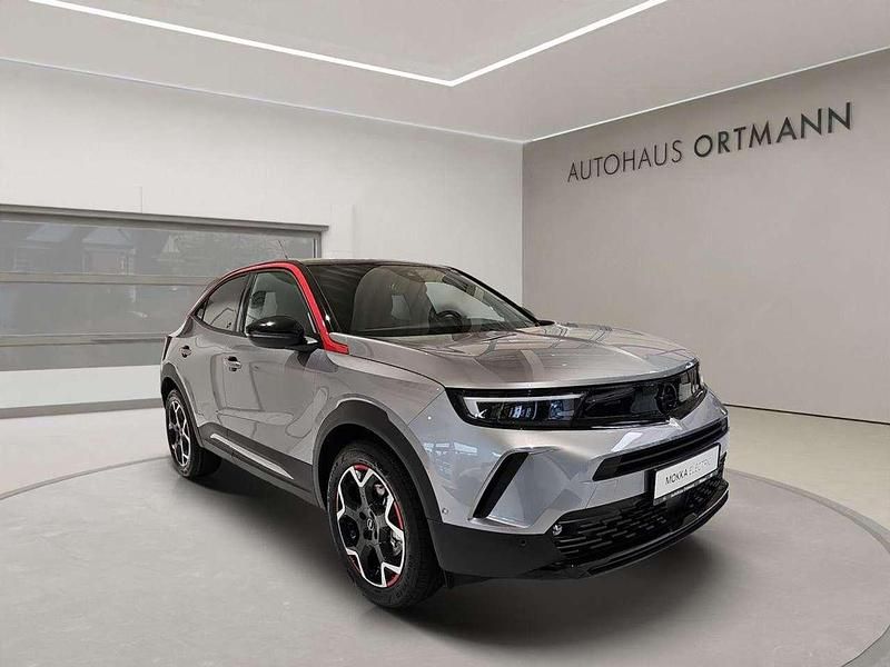 Lack grau artense/typ aussenve Gebraucht 2023 Opel Mokka-e GS Line SUV | 32.890 € - Bild 1/4