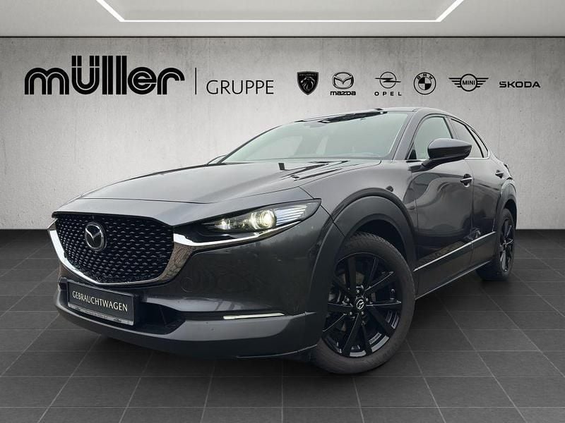 Machine gray Gebraucht 2021 Mazda CX-30 Selection SUV | 21.901 € (Fairer Preis) - Bild 1/4