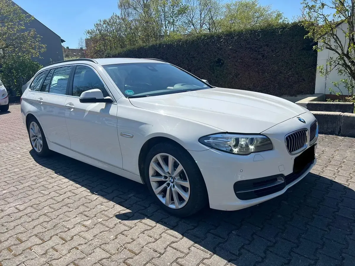 Second-hand BMW 520 Comfort Edition 190 CP (139 kW) 2015 Alb Break