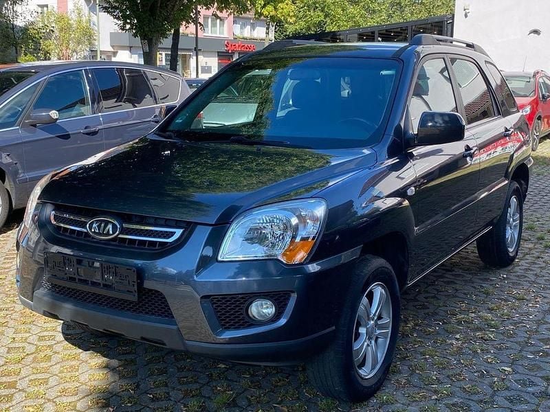 Grau Gebraucht 2010 Kia Sportage SUV | 5.990 € (Fairer Preis) - Bild 1/4