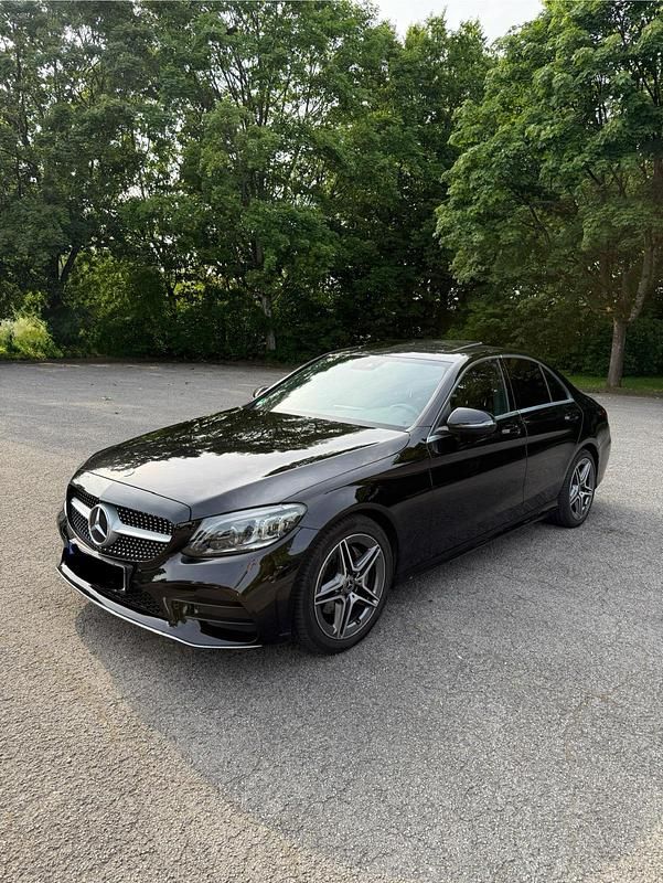 Schwarz Gebraucht 2020 Mercedes C180 AMG line Limousine | 25.000 € - Bild 1/4
