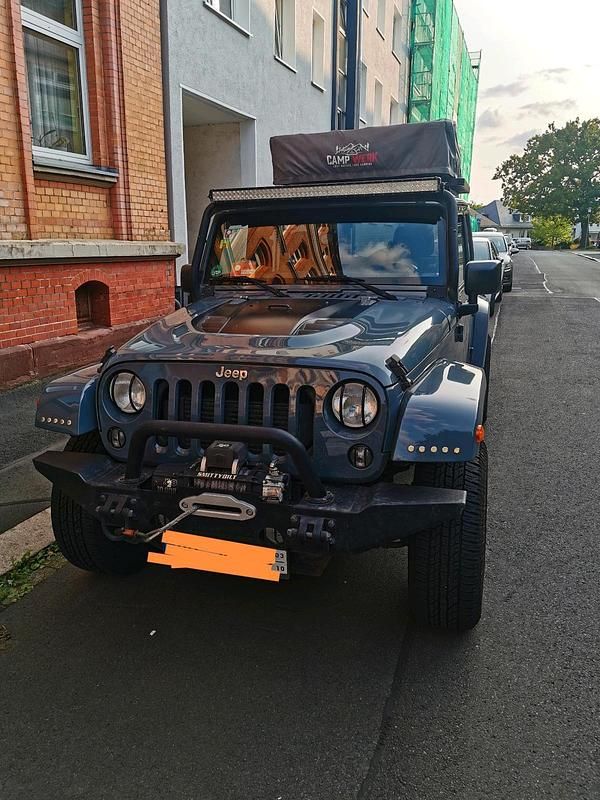 Grau Gebraucht 2015 Jeep Wrangler SUV | 39.500 € (Teuer) - Bild 1/4