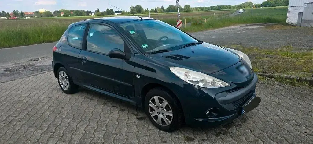 Gebraucht Peugeot 206+ 74 PS (54 kW) 2009 Grau Kleinwagen