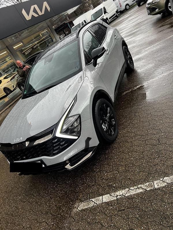 Grau Gebraucht 2023 Kia Sportage SUV | 31.499 € (Guter Preis) - Bild 1/4