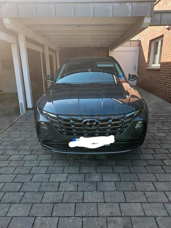 Grau Gebraucht 2023 Hyundai Tucson SUV | 24.500 € (Superpreis) - Bild 1/4