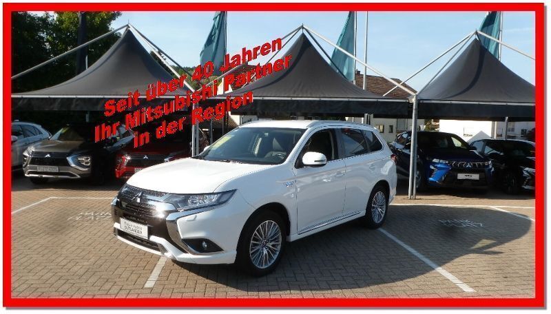 Andenweiß Gebraucht 2019 Mitsubishi Outlander P-HEV Basis SUV | 17.890 € (Superpreis) - Bild 1/4