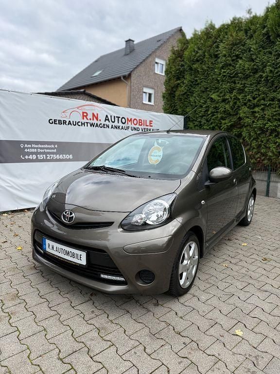 Gebraucht Toyota Aygo Cool 68 PS (50 kW) 2013 Braun Kleinwagen