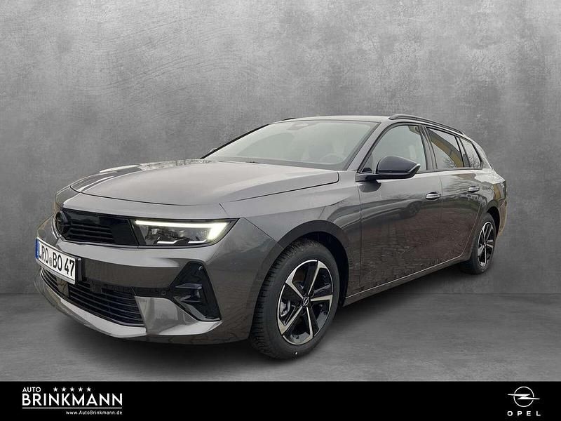 Vulkan grau Gebraucht 2024 Opel Astra GS Line Kombi | 22.990 € - Bild 1/4