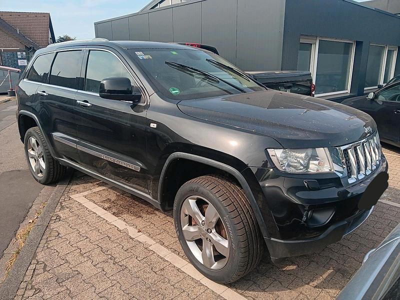 Schwarz Gebraucht 2012 Jeep Grand Cherokee SUV | 4.500 € (Superpreis) - Bild 1/4