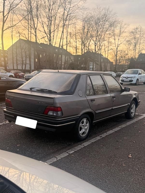 Gebraucht Peugeot 309 90 PS (66 kW) 1990 Braun Kleinwagen