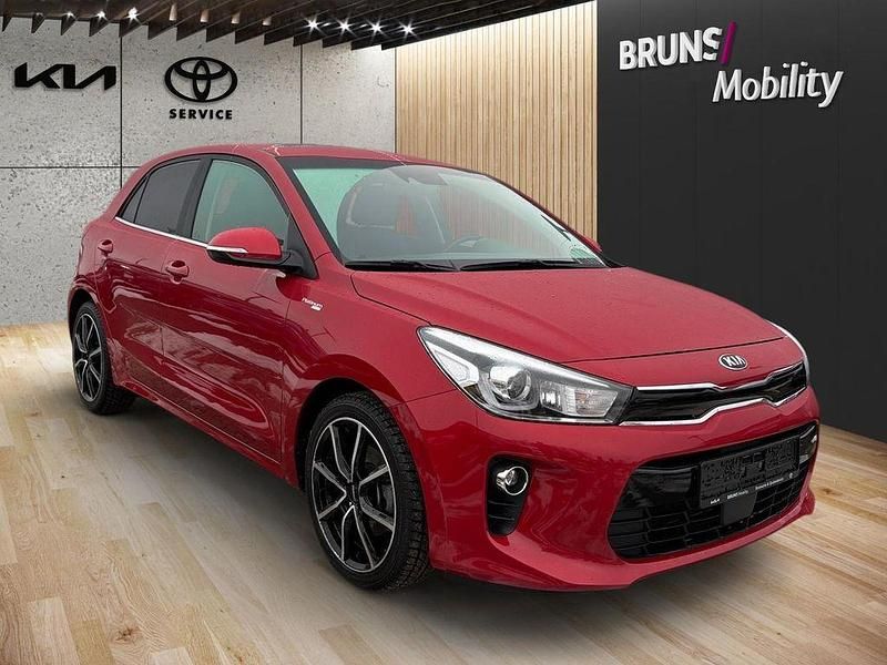 Gebraucht Kia Rio Platinum Edition 120 PS (88 kW) 2020 (beg) signalrot met. Limousine