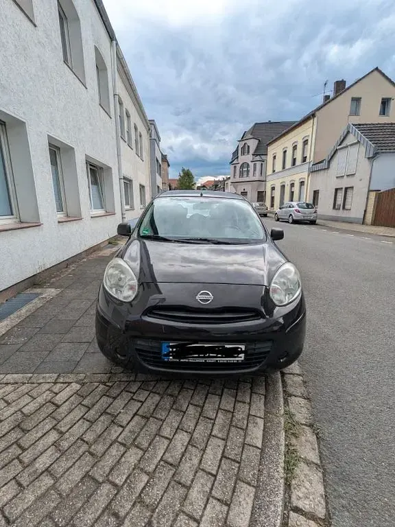 Gebraucht Nissan Micra 80 PS (58 kW) 2011 Schwarz Kleinwagen