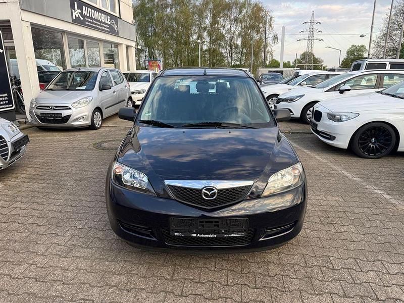 Używany Mazda 2 Comfort 75 KM (55 kW) 2005 Czarny Hatchback