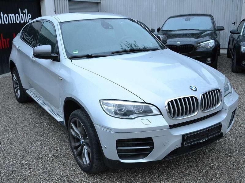 Perlsilber metallic Gebraucht 2013 BMW X6 M50 SUV | 16.999 € - Bild 1/4