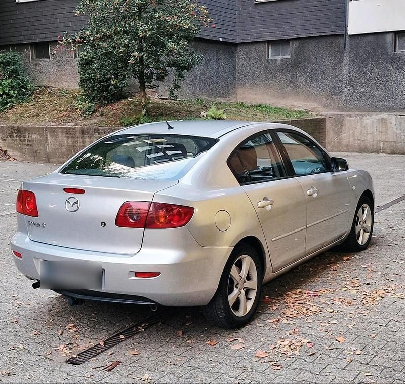 Second-hand Mazda 3 77 CP (56 kW) 2004 Argintiu Berlinǎ