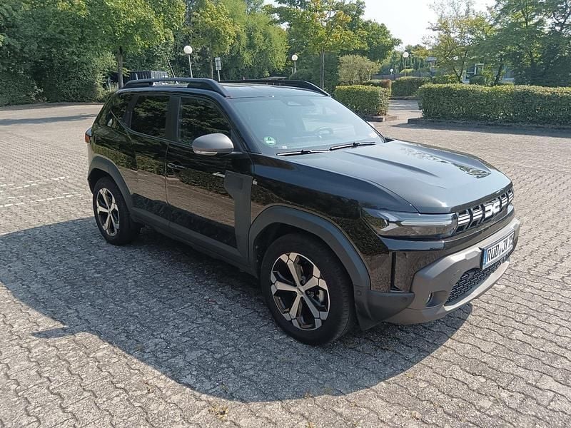 Schwarz Gebraucht 2024 Dacia Duster Journey SUV | 23.500 € - Bild 1/4
