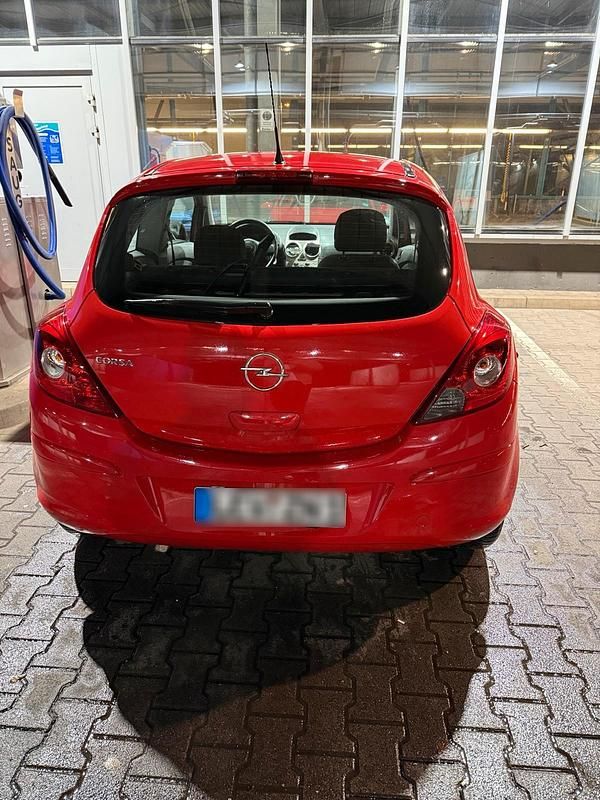 Second-hand Opel Corsa Selection 80 CP (58 kW) 2009 Roșu Hatchback