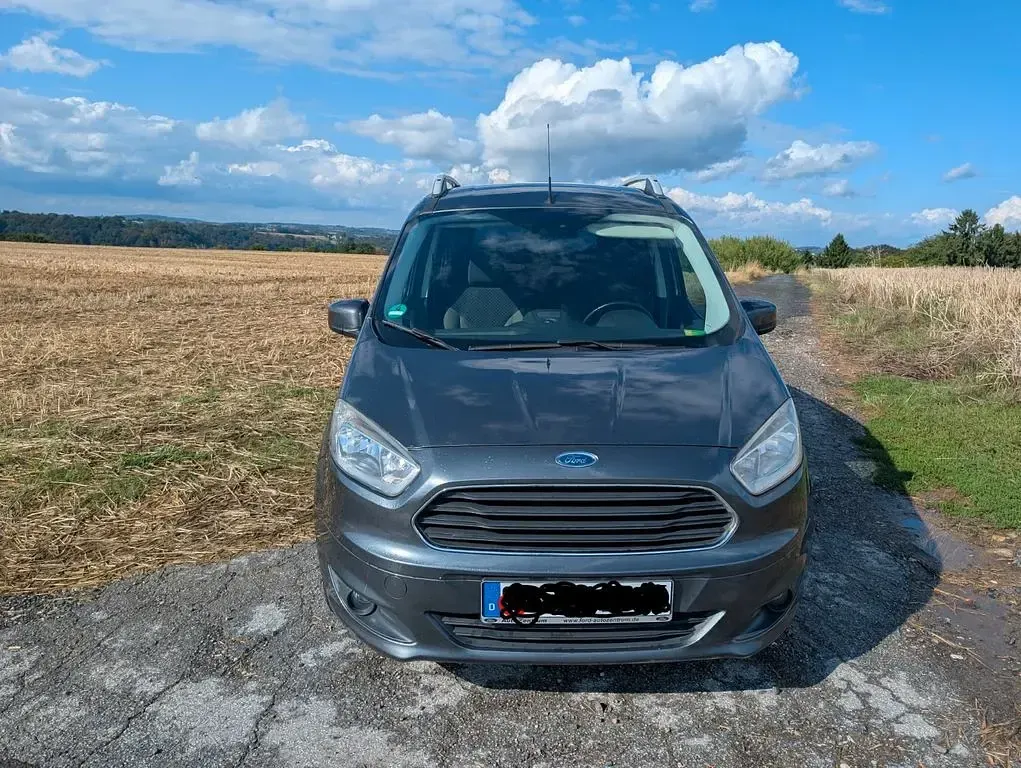 Gebraucht Ford Tourneo Courier Trend 101 PS (74 kW) 2016 Grau Van / Kleinbus