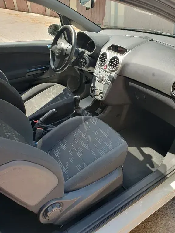 Gebraucht Opel Corsa Selection 69 PS (50 kW) 2014 Weiß Kleinwagen