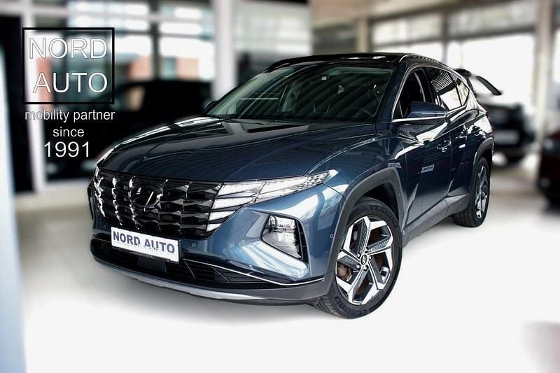 Grau Gebraucht 2021 Hyundai Tucson Prime SUV | 28.970 € (Fairer Preis) - Bild 1/4
