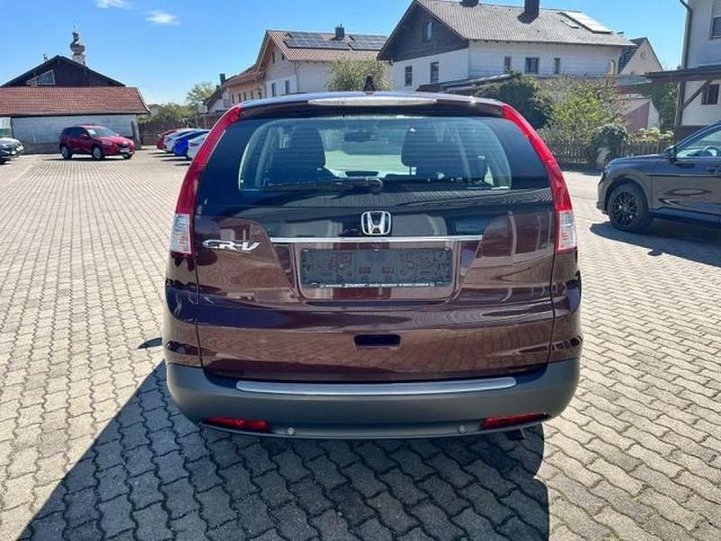 Käytetty Honda CR-V Elegance 120 HP (88 kW) 2014 Ruskea Katumaasturi