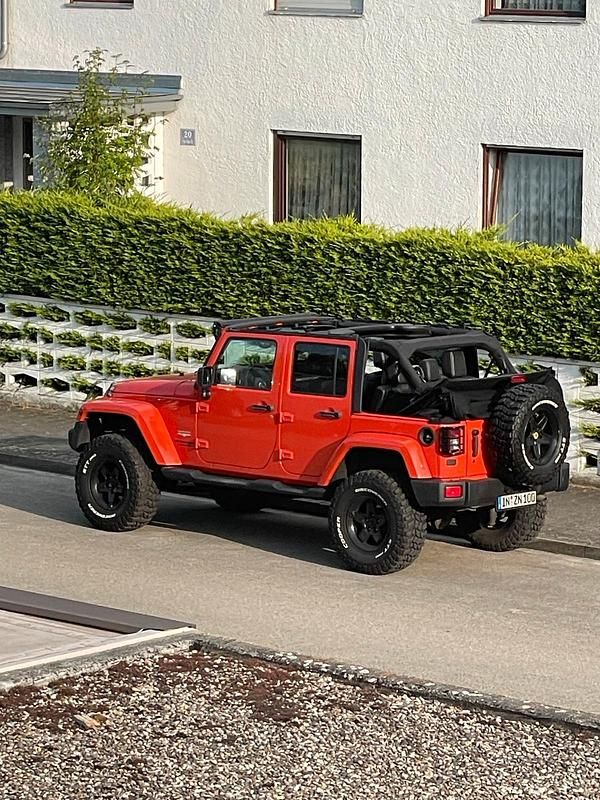 Orange Gebraucht 2015 Jeep Wrangler SUV | 27.500 € (Superpreis) - Bild 1/4