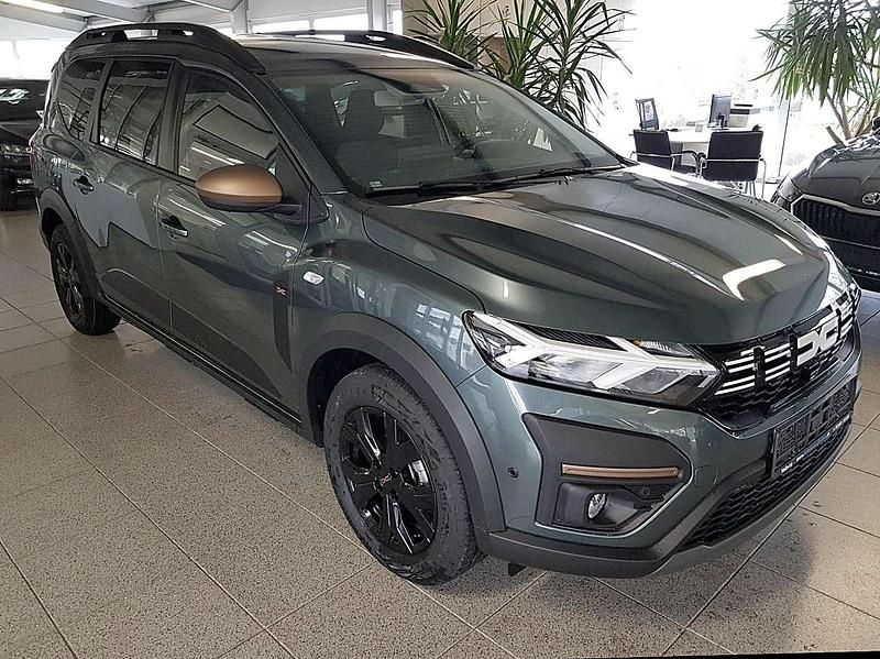 Zedergrün Gebraucht 2024 Dacia Jogger Extreme Van / Kleinbus | 22.850 € (Fairer Preis) - Bild 1/4