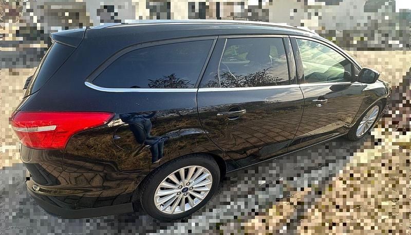 Gebraucht Ford Focus Titanium 125 PS (91 kW) 2014 Schwarz Kombi