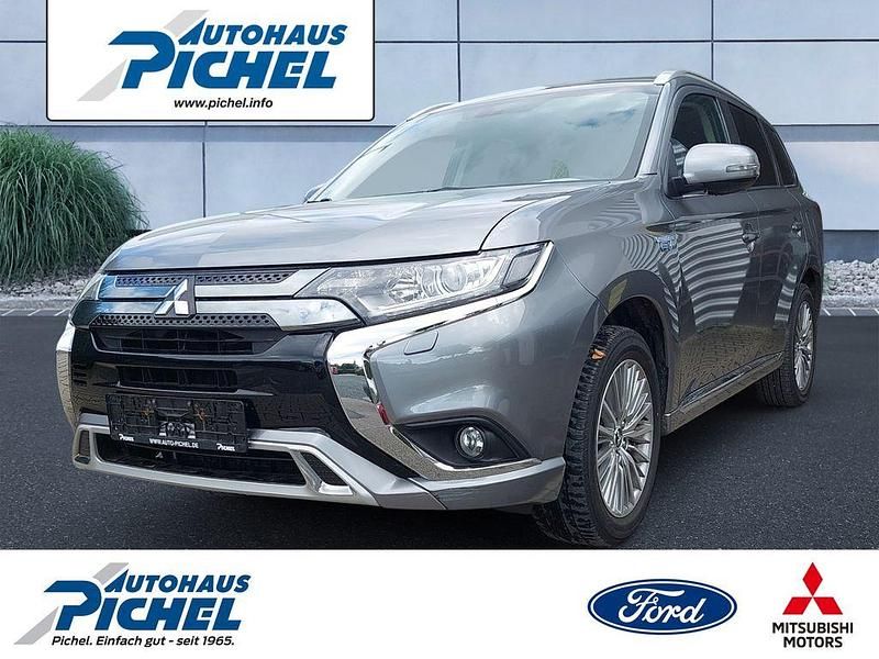 Grau(metallic) Gebraucht 2019 Mitsubishi Outlander P-HEV Basis SUV | 19.890 € (Fairer Preis) - Bild 1/4