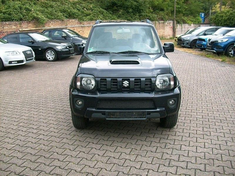 Schwarz Gebraucht 2013 Suzuki Jimny Style SUV | 8.899 € (Guter Preis) - Bild 1/4