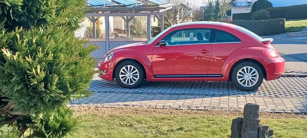 Używany VW Beetle Sport 200 KM (147 kW) 2013 Czerwony Hatchback