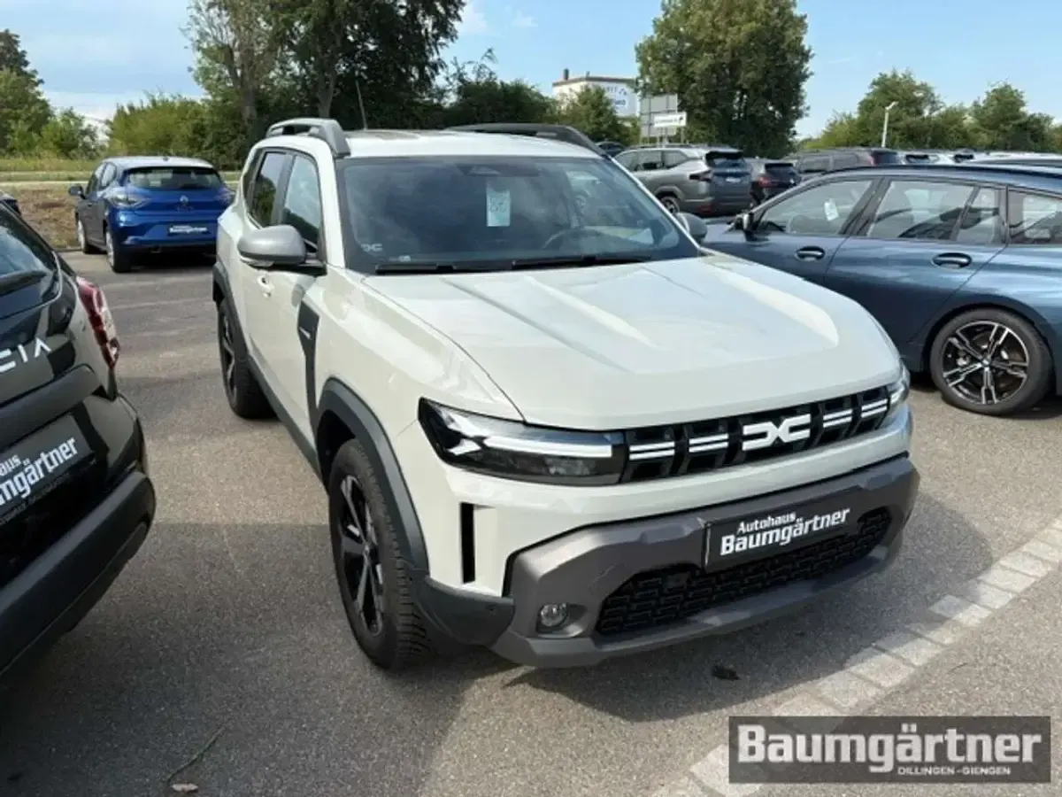 Gebraucht Dacia Duster Journey 141 PS (103 kW) 2025 Sandstonebeige metallic SUV