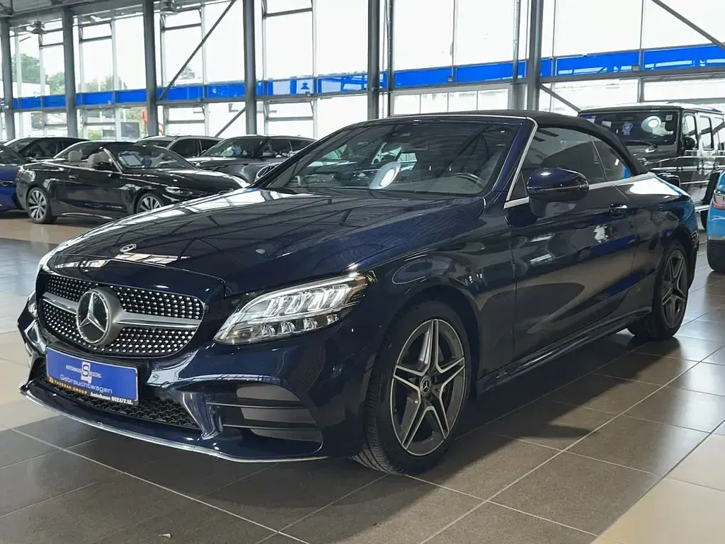 Gebraucht Mercedes C300 AMG line 258 PS (189 kW) 2022 Blau cavansitblau  metalliclack (metallic) Cabrio
