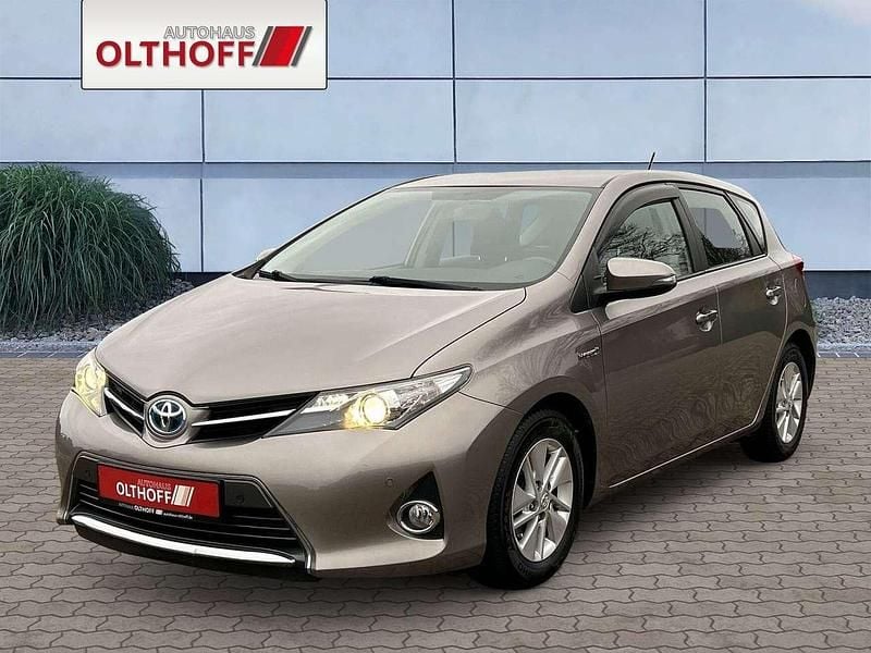 Avantgarde bronze Gebraucht 2013 Toyota Auris Hybrid Edition Limousine | 11.670 € (Fairer Preis) - Bild 1/4