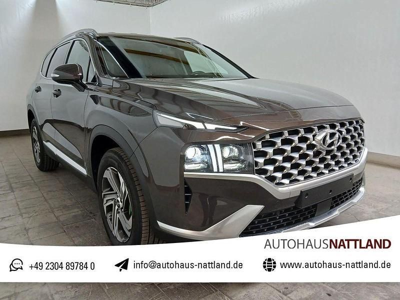 Taiga brown / mic Gebraucht 2023 Hyundai Santa Fe Trend SUV | 36.950 € (Guter Preis) - Bild 1/4