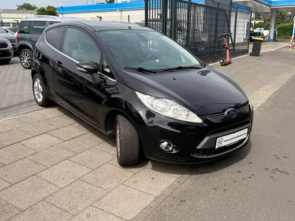 Gebraucht Ford Fiesta Titanium 82 PS (60 kW) 2012 Schwarz Kleinwagen