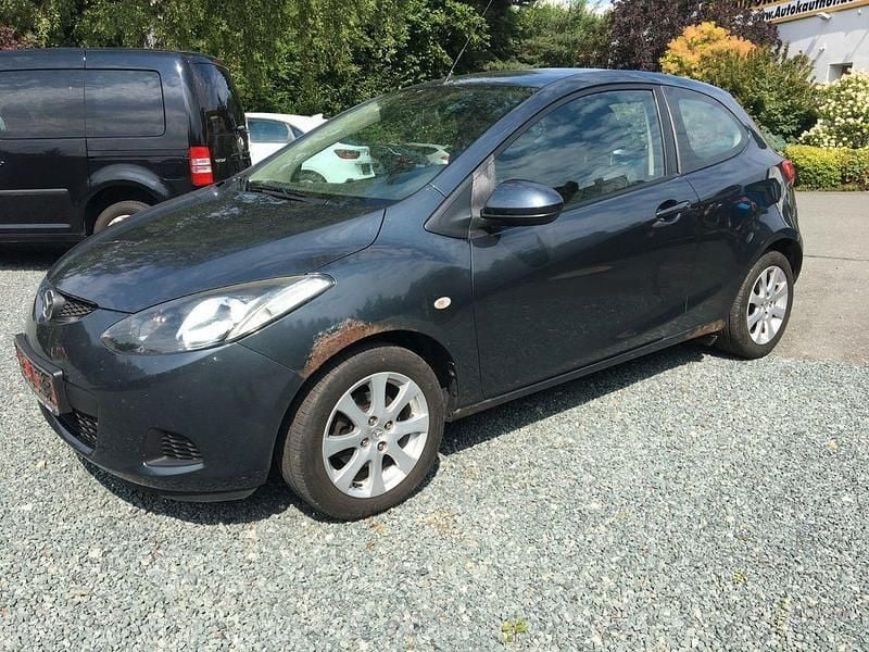Grau Gebraucht 2009 Mazda 2 Inclusive Limousine | 990 € (Superpreis) - Bild 1/4