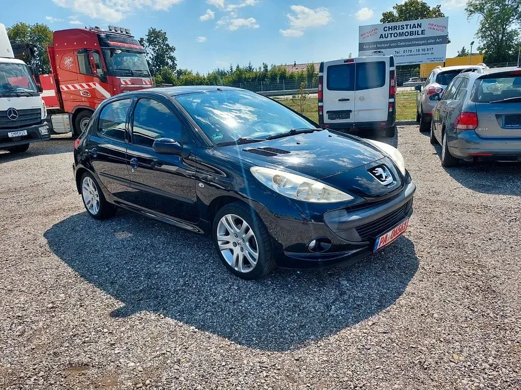 Gebraucht Peugeot 206+ 73 PS (53 kW) 2011 Schwarz Kleinwagen