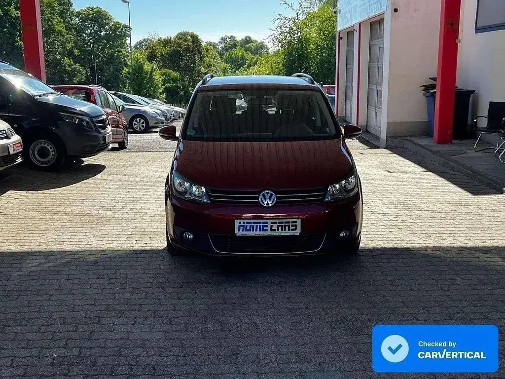 Gebraucht VW Touran Comfortline 105 PS (77 kW) 2010 Wild cherry red metallic Van / Kleinbus