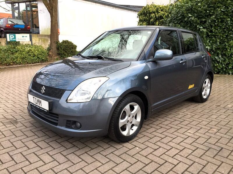 Grau Gebraucht 2006 Suzuki Swift Comfort Limousine | 5.490 € - Bild 1/4