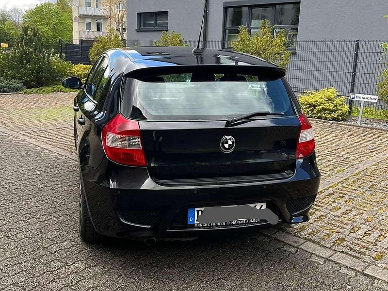 Second-hand BMW 116 109 CP (80 kW) 2006 Negru Hatchback
