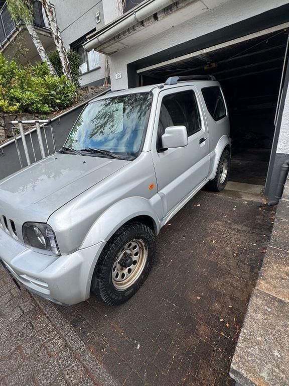 Grau Gebraucht 2005 Suzuki Jimny Comfort SUV | 3.800 € (Superpreis) - Bild 1/4