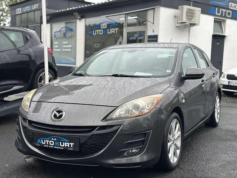 Grau Gebraucht 2010 Mazda 3 High Kleinwagen | 4.999 € (Fairer Preis) - Bild 1/4