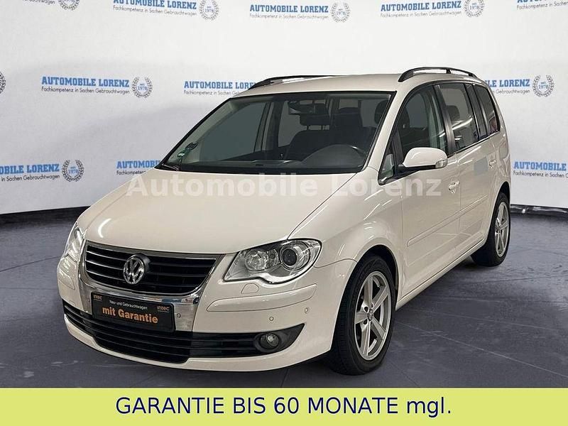 Weiß Gebraucht 2007 VW Touran Highline Van / Kleinbus | 4.990 € (Fairer Preis) - Bild 1/4