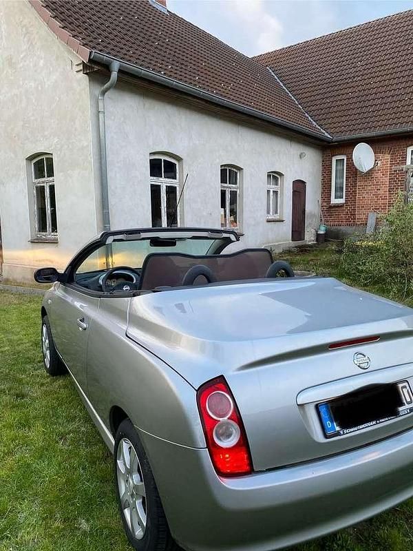 Silber Gebraucht 2006 Nissan Micra C+C Cabrio | 1.999 € (Fairer Preis) - Bild 1/4
