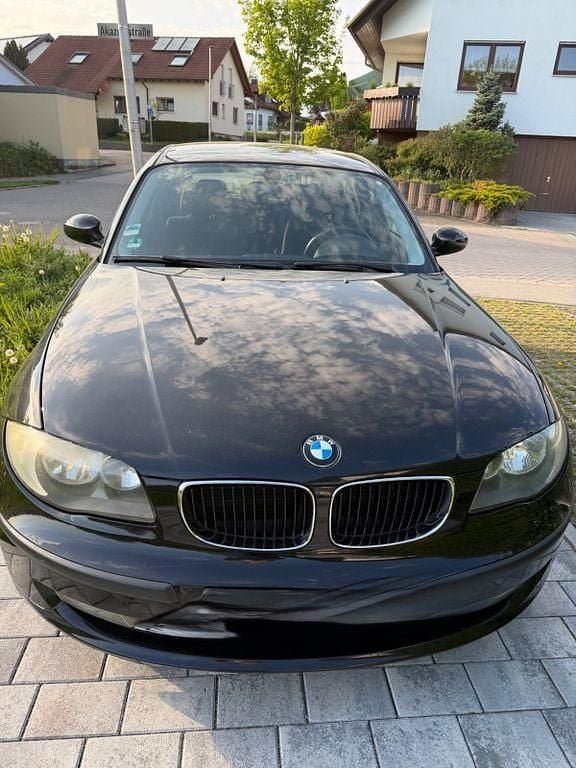 Second-hand BMW 116 122 CP (89 kW) 2009 Negru Hatchback