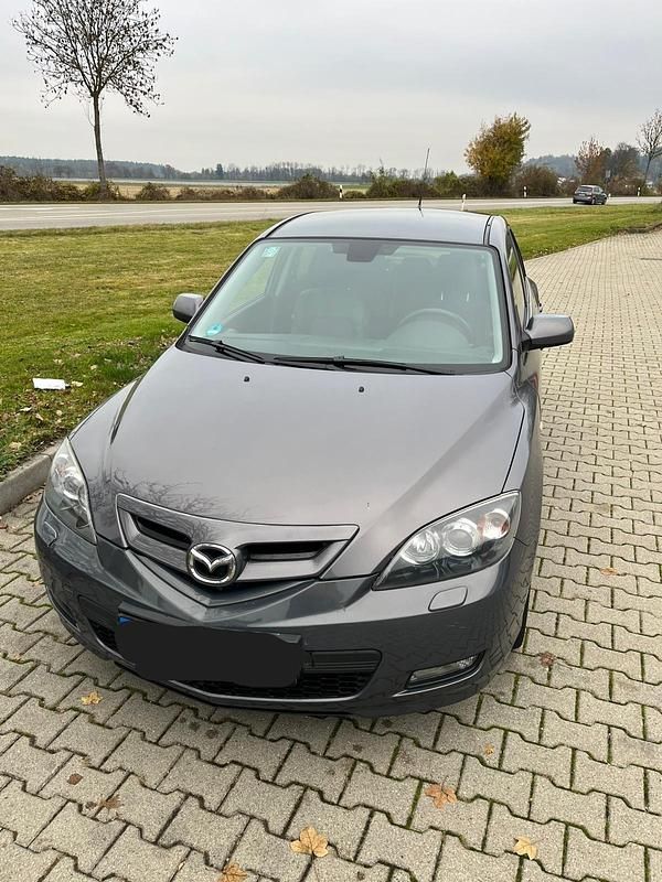 Grau Gebraucht 2009 Mazda 3 Kleinwagen | 2.999 € (Fairer Preis) - Bild 1/4