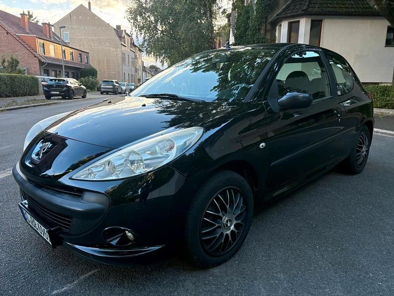 Schwarz Gebraucht 2009 Peugeot 206+ Kleinwagen | 1.490 € - Bild 1/4